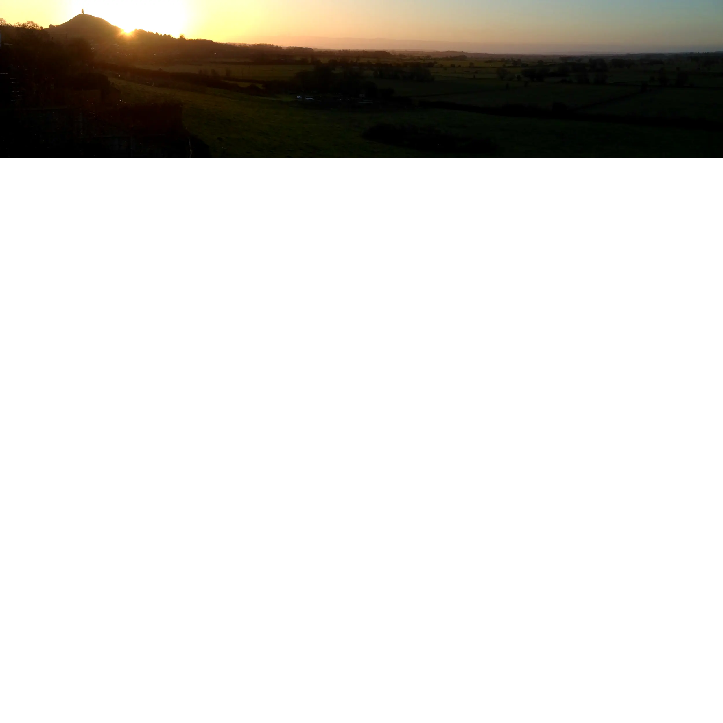 Glastonbury Tor Silhouette Photo with Sunrise by Michiel Kroon