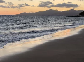 Beautiful beach at sunset, reflection on inner experience