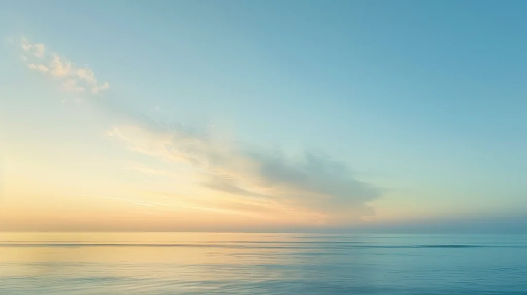 Calm ocean horizon at golden dawn.
